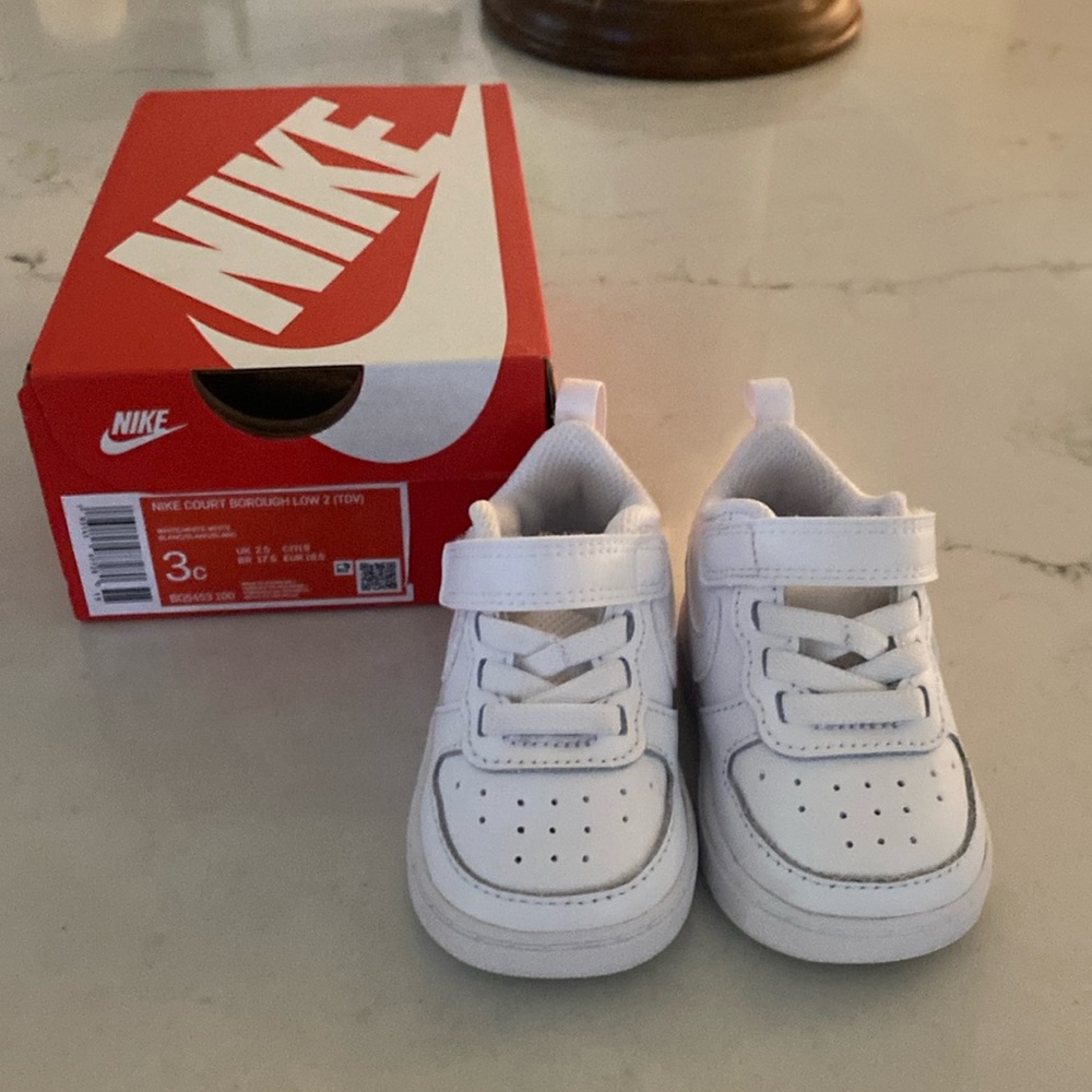 Never worn Nike Court baby shoes